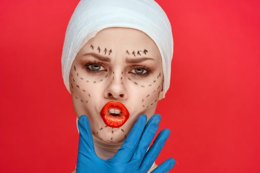 portrait of a woman Red lips plastic surgery operation bare shoulders isolated background. High quality photo