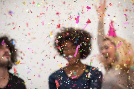 confetti party happy young people group celebrating new year eve while dancing and have fun at home