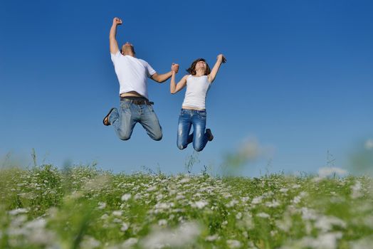 happy young couple in love have romance and fun at wheat field in summer