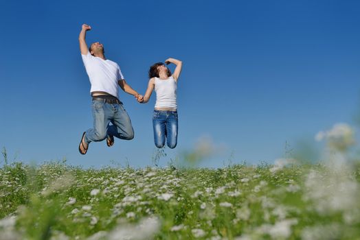 happy young couple in love have romance and fun at wheat field in summer