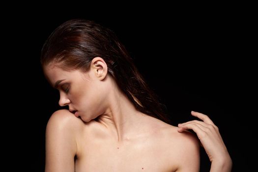 portrait of a woman emotions gesture hands bare shoulders close-up. High quality photo