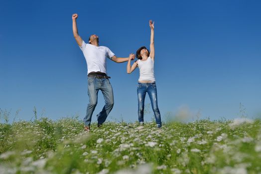 happy young couple in love have romance and fun at wheat field in summer