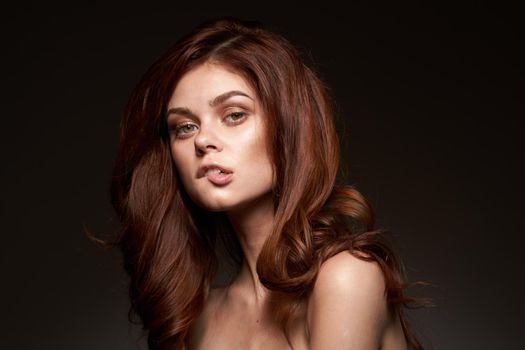 pretty woman makeup posing naked shoulders hairstyle cropped view. High quality photo