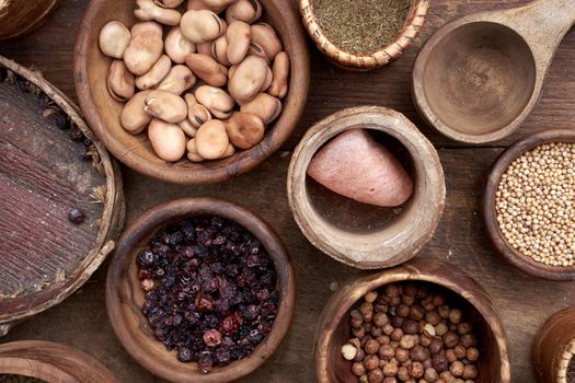 Medieval food in wooden and ceramic dinnerware