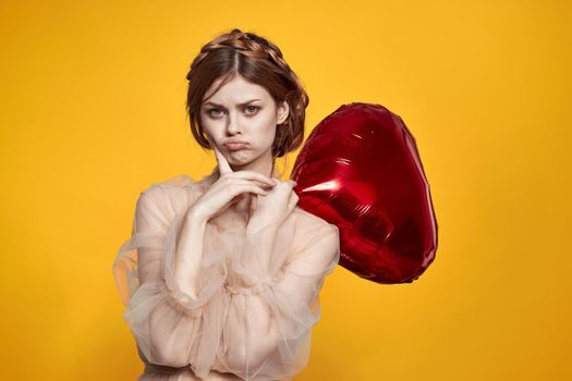 pretty woman heart balloon holiday Valentine's Day model studio. High quality photo