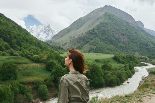 woman hiker mountains landscape travel fresh air. High quality photo