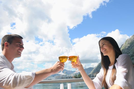 happy young couple having lanch at beautiful restaurant on the beach