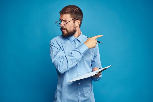 business man with glasses emotions blue background. High quality photo