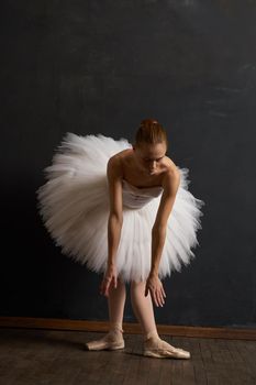 ballerina dance classic performance the dark background. High quality photo