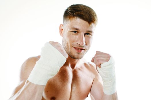 muscular man with bandaged arms gym boxer. High quality photo