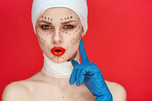a person posing in blue gloves red lips surgery facial rejuvenation studio lifestyle. High quality photo