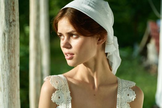 Woman in white dress countryside village nature ecology. High quality photo