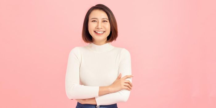 Attractive charming business lady smiling hold arms hands crossed good mood self-confident successful worker person wear white t-shirt isolated pink color background