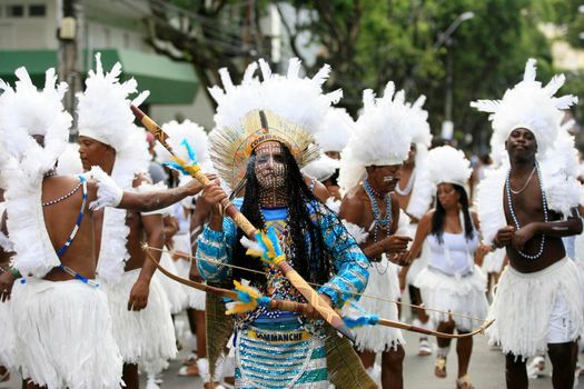 salvador, bahia, brazil - february 24, 2017: Members of the Commanches carnival block are seen during a parade on the Salvador city's carnival circuit.