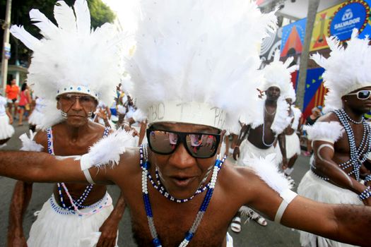 salvador, bahia, brazil - february 24, 2017: Members of the Commanches carnival block are seen during a parade on the Salvador city's carnival circuit.