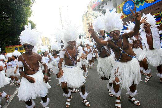 salvador, bahia, brazil - february 24, 2017: Members of the Commanches carnival block are seen during a parade on the Salvador city's carnival circuit.