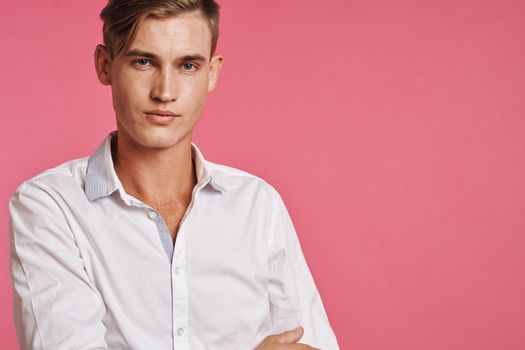 portrait of a man fashion hairstyle hand gestures modern style isolated background. High quality photo