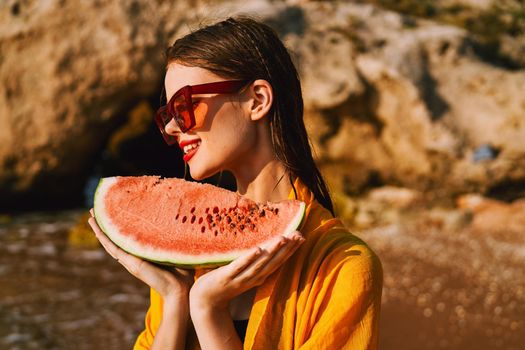 pretty woman with watermelon outdoors summer vacation. High quality photo