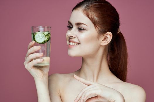 pretty woman with cucumber drink vitamins health beauty. High quality photo