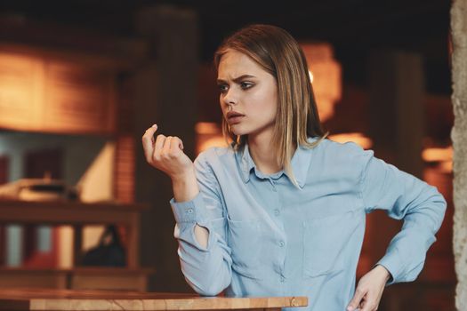 Business woman in a cafe outdoors fresh air summer. High quality photo