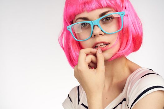 glamorous woman with pink hair fashion glasses home model. High quality photo