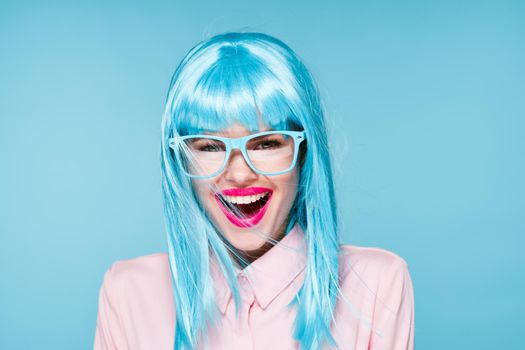 Glamorous woman blue wig makeup fashion posing. High quality photo