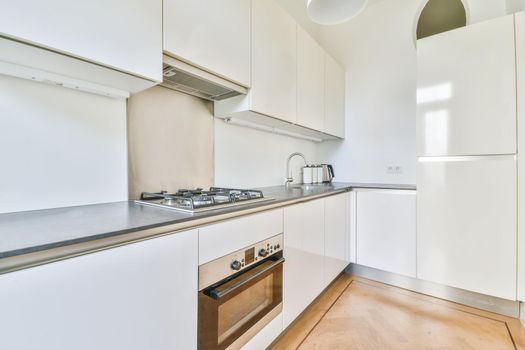 A bright luxury kitchen in an elegant house