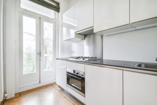 A bright luxury kitchen in an elegant house