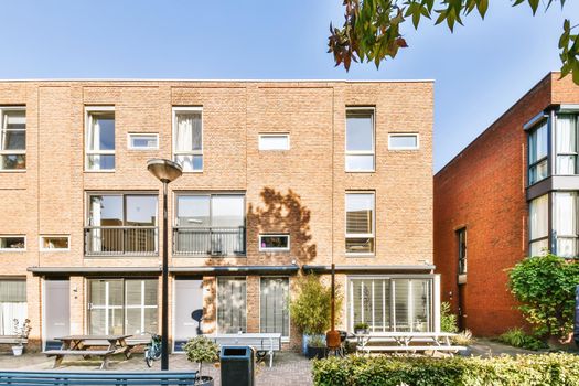 Precarious view of a multi-storey brick building