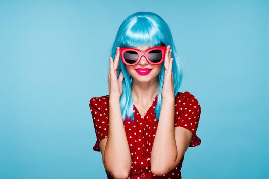 beautiful woman in blue wig sunglasses Glamor close-up. High quality photo