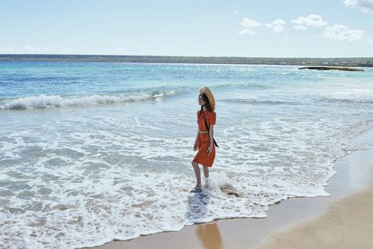 woman by the ocean beach start island landscape paradise. High quality photo