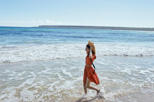 woman by the ocean beach start island landscape paradise. High quality photo