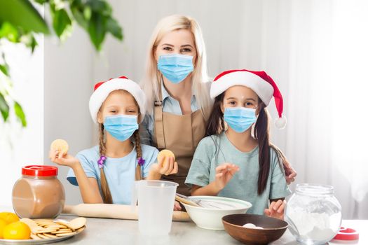 People with gifts wearing facemasks during coronavirus and flu outbreak on Christmas. Virus and illness protection, home quarantine. COVID-2019