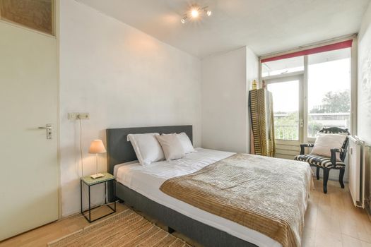 Large delightful bedroom with soft bed and parquet floor