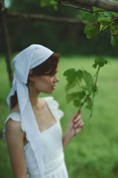 woman outdoors in garden countryside ecology nature. High quality photo