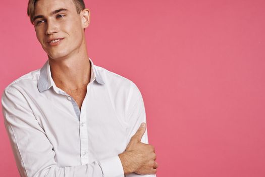 handsome man posing white shirt fashion self confidence studio lifestyle. High quality photo
