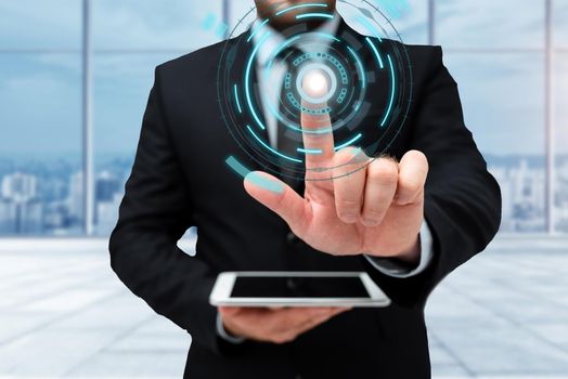 Man In Uniform Standing Holding Tablet Typing Futuristic Technologies.