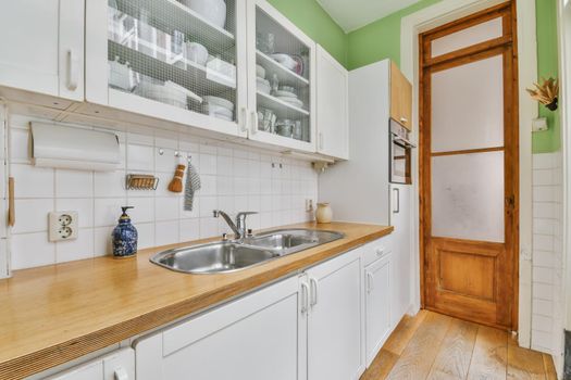 Interior of a small long cozy kitchen