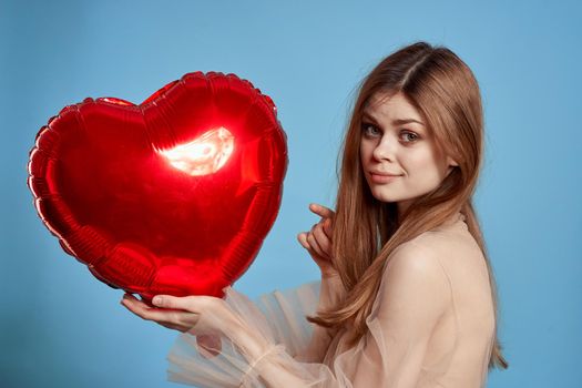 portrait of a woman heart balloon holiday Valentine's Day isolated background. High quality photo