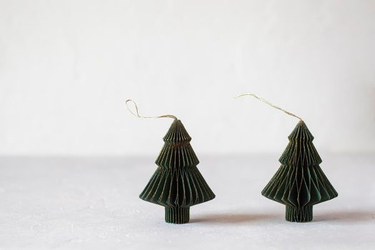 New Year and Christmas paper green and golden decorative trees, zero waste concept