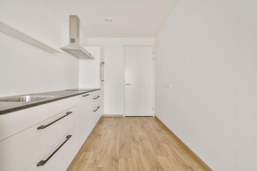 Interior of empty home kitchen with contemporary appliances