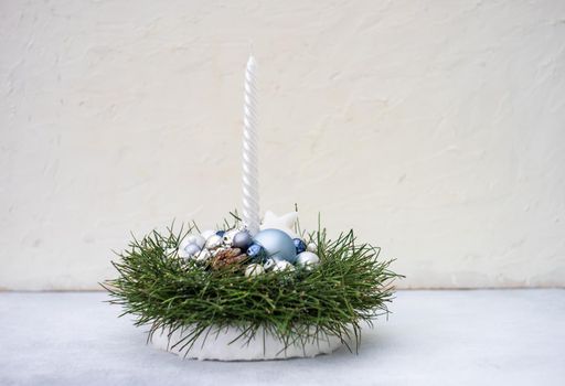 Christmas interior plant based composition with candles