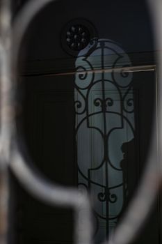 Old door shadow in sunny day in Old Tbilisi, Georgia