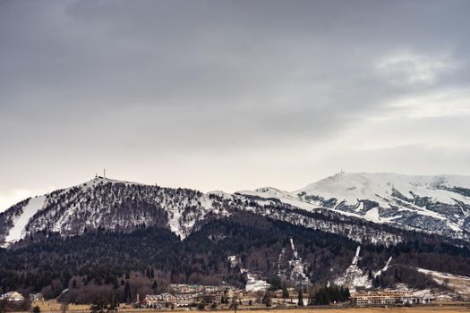 Bakuriani town in the valley among slopes of Caucasus mountains