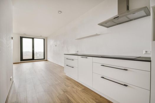 Interior of empty home kitchen with contemporary appliances