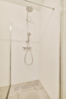 Modern shower stall in a bright bathroom