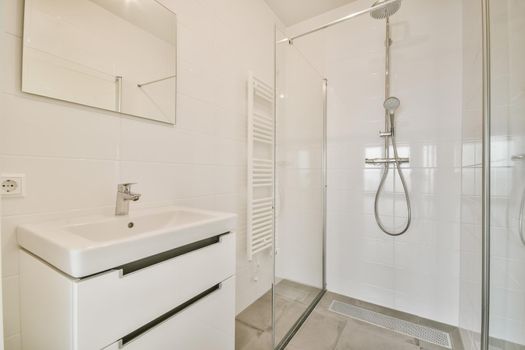 Modern shower stall in a bright bathroom