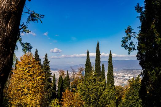 Autumnal view to Caucasus mountain from hill top over Tbilisi Old town