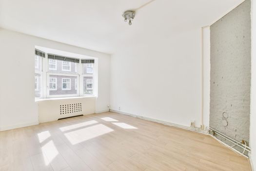 Spacious bright and pretty room with large windows