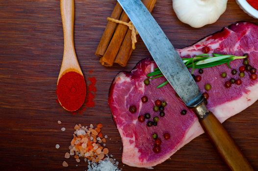 raw uncooked  ribeye beef steak butcher selection